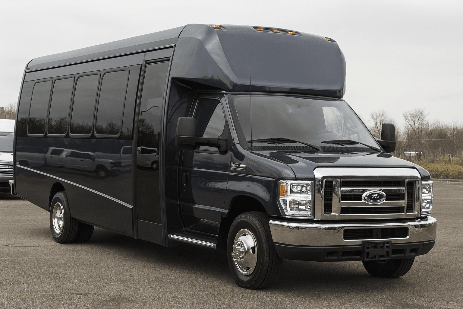 Vehicle photo: 32 Passenger Coach Bus exterior